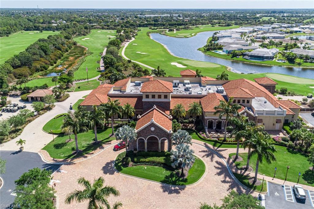 9731 Acqua Court, Unit 536 Naples, FL 34113 - Photo 39 of 48 an aerial view of residential houses with outdoor space and river