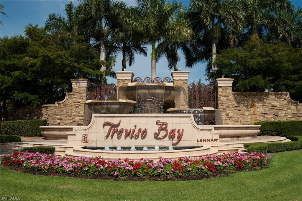 9731 Acqua Court, Unit 536 Naples, FL 34113 - Photo 48 of 48 a view of garden with flowers and trees