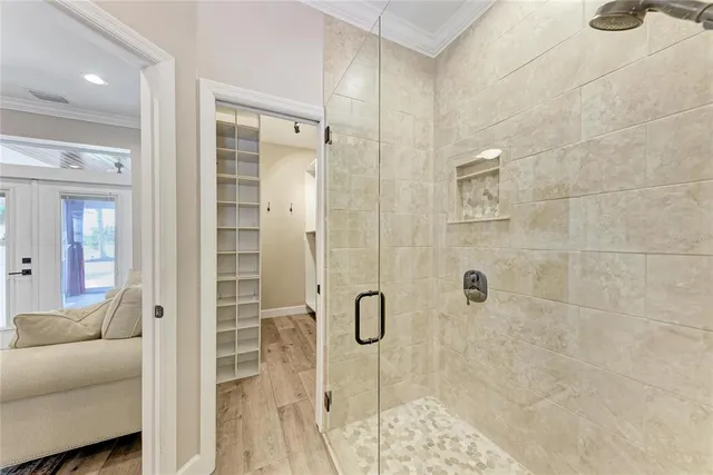 a view of a swimming pool with an outdoor space and seating area