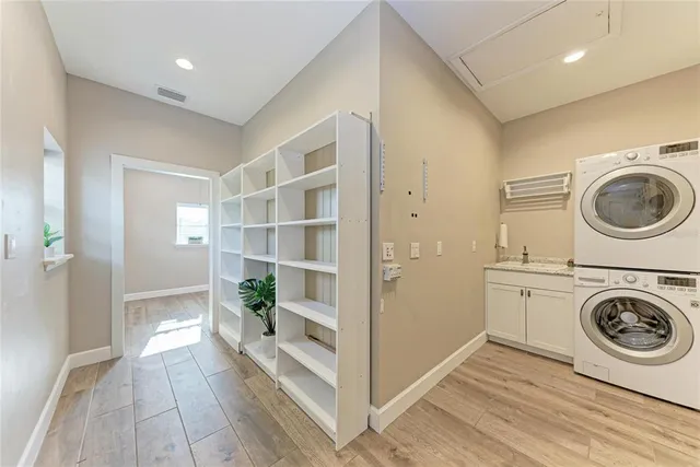an aerial view of a house with swimming pool garden and outdoor seating
