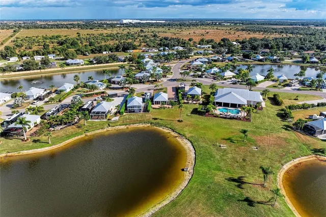 a view of swimming pool with outdoor seating and yard