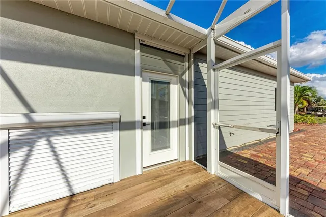 a living room with a fireplace and a rug