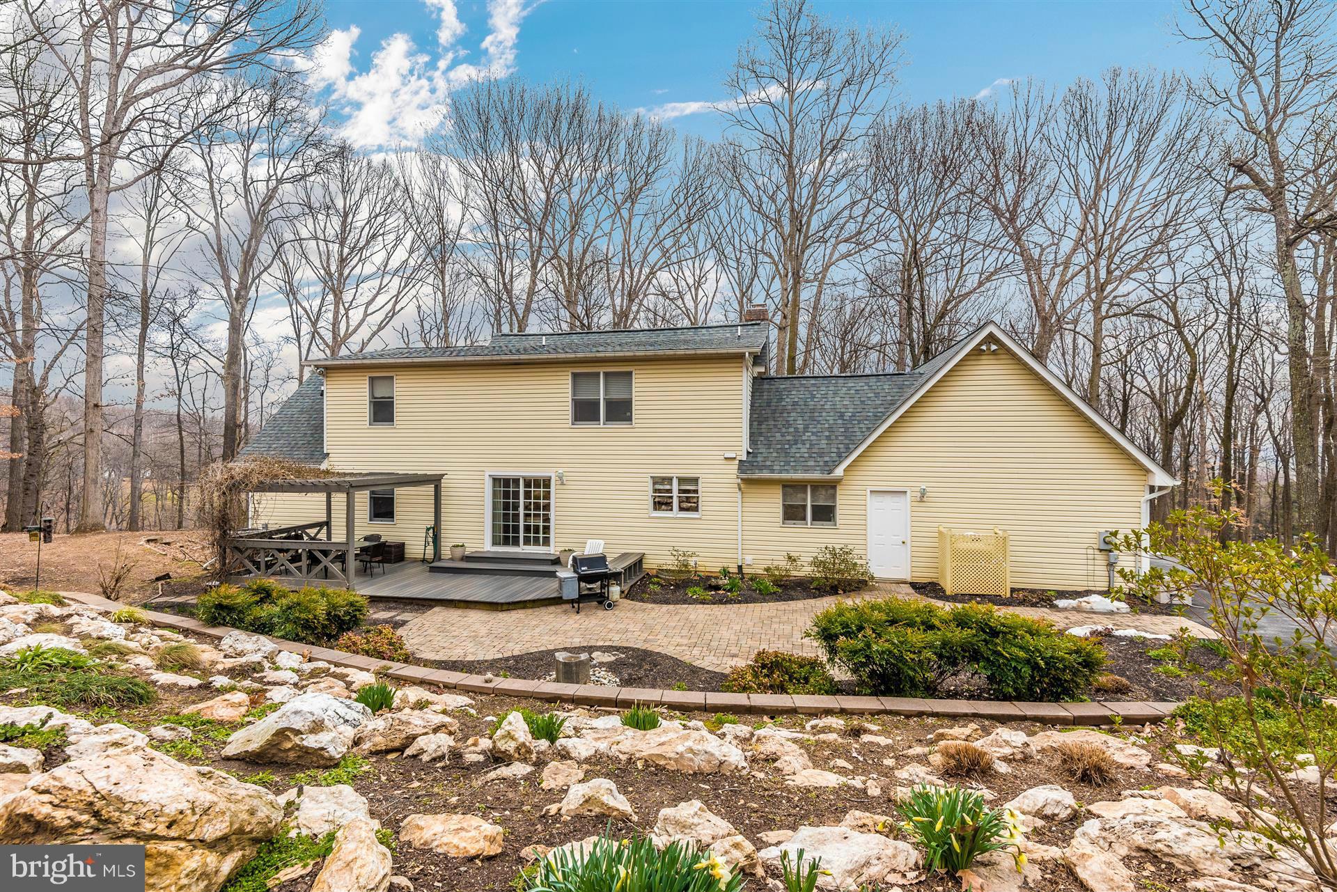 4230 Basford Road Frederick, MD 21703 - Photo 3 of 30 a view of a house with a yard covered in snow