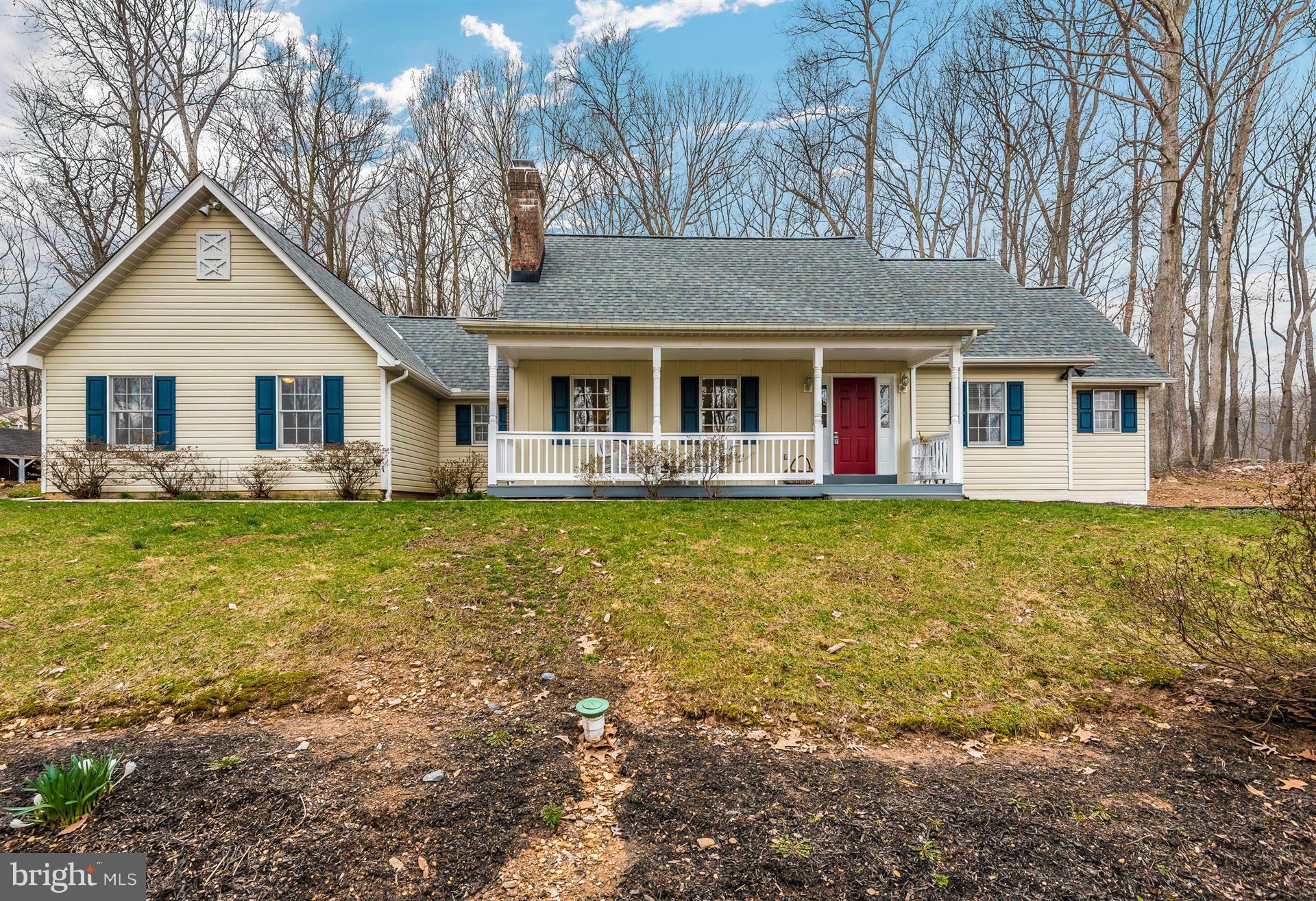 4230 Basford Road Frederick, MD 21703 - Photo 30 of 30 a front view of house with yard and trees around