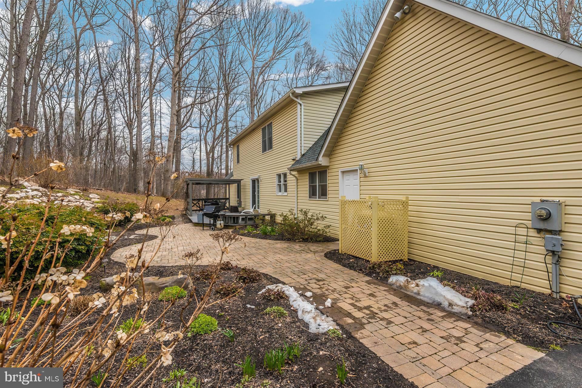 4230 Basford Road Frederick, MD 21703 - Photo 4 of 30 a view of a backyard with sitting area