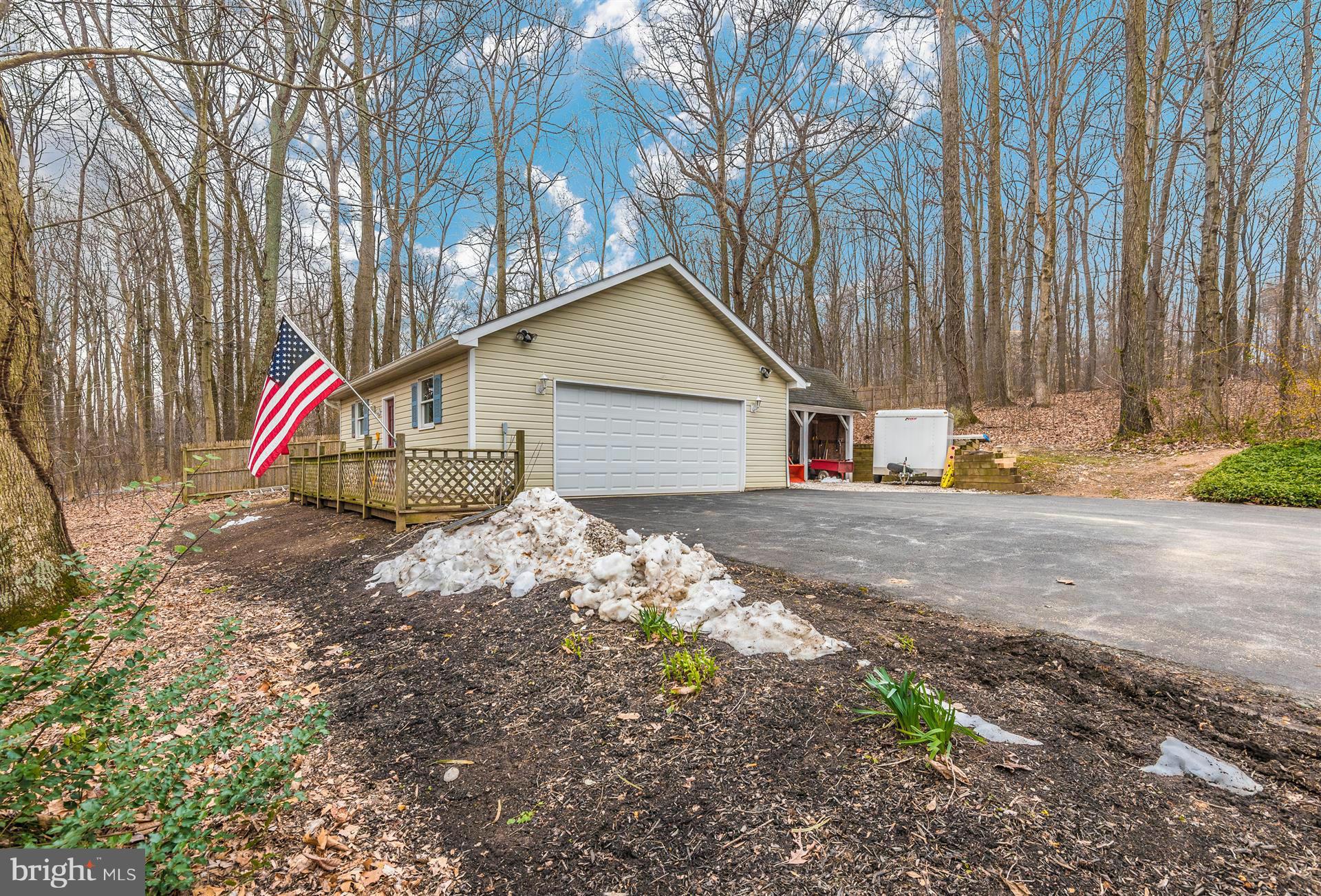4230 Basford Road Frederick, MD 21703 - Photo 7 of 30 a house with trees in front of it