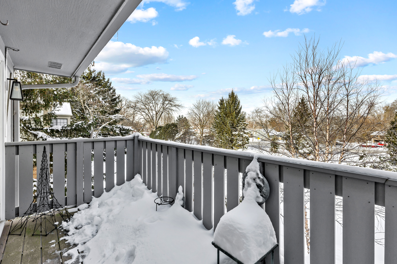 1907 Gresham Circle, Unit D Wheaton, IL 60189 - Photo 23 of 26 a view of a two chairs in the roof deck