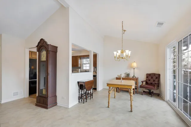 a room with furniture and a chandelier