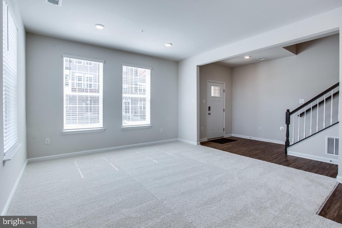 7068 Delegate Place Frederick, MD 21703 - Photo 11 of 76 a view of an empty room with a window