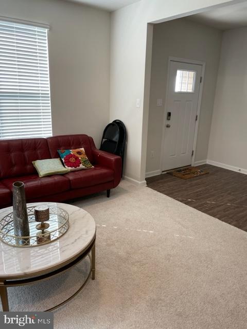 7068 Delegate Place Frederick, MD 21703 - Photo 16 of 76 a living room with furniture and window
