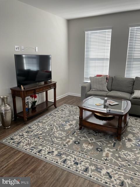 7068 Delegate Place Frederick, MD 21703 - Photo 33 of 76 a living room with furniture and a flat screen tv