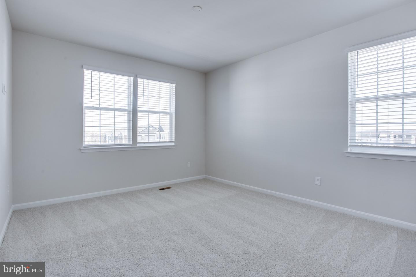7068 Delegate Place Frederick, MD 21703 - Photo 35 of 76 an empty room with a window