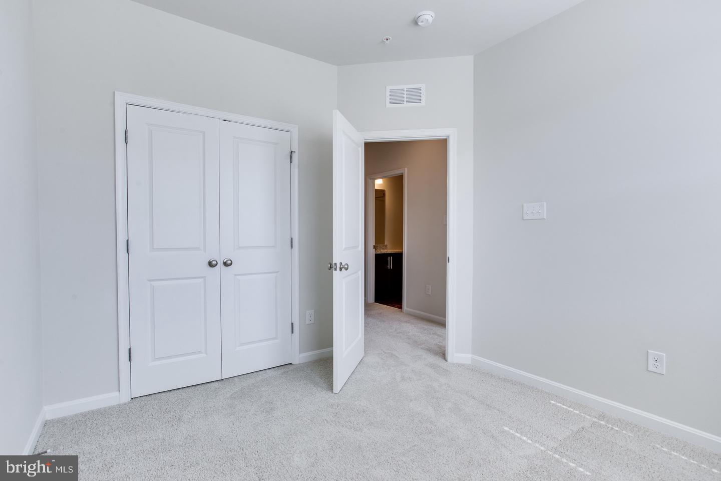7068 Delegate Place Frederick, MD 21703 - Photo 41 of 76 a view of an empty room and closet area