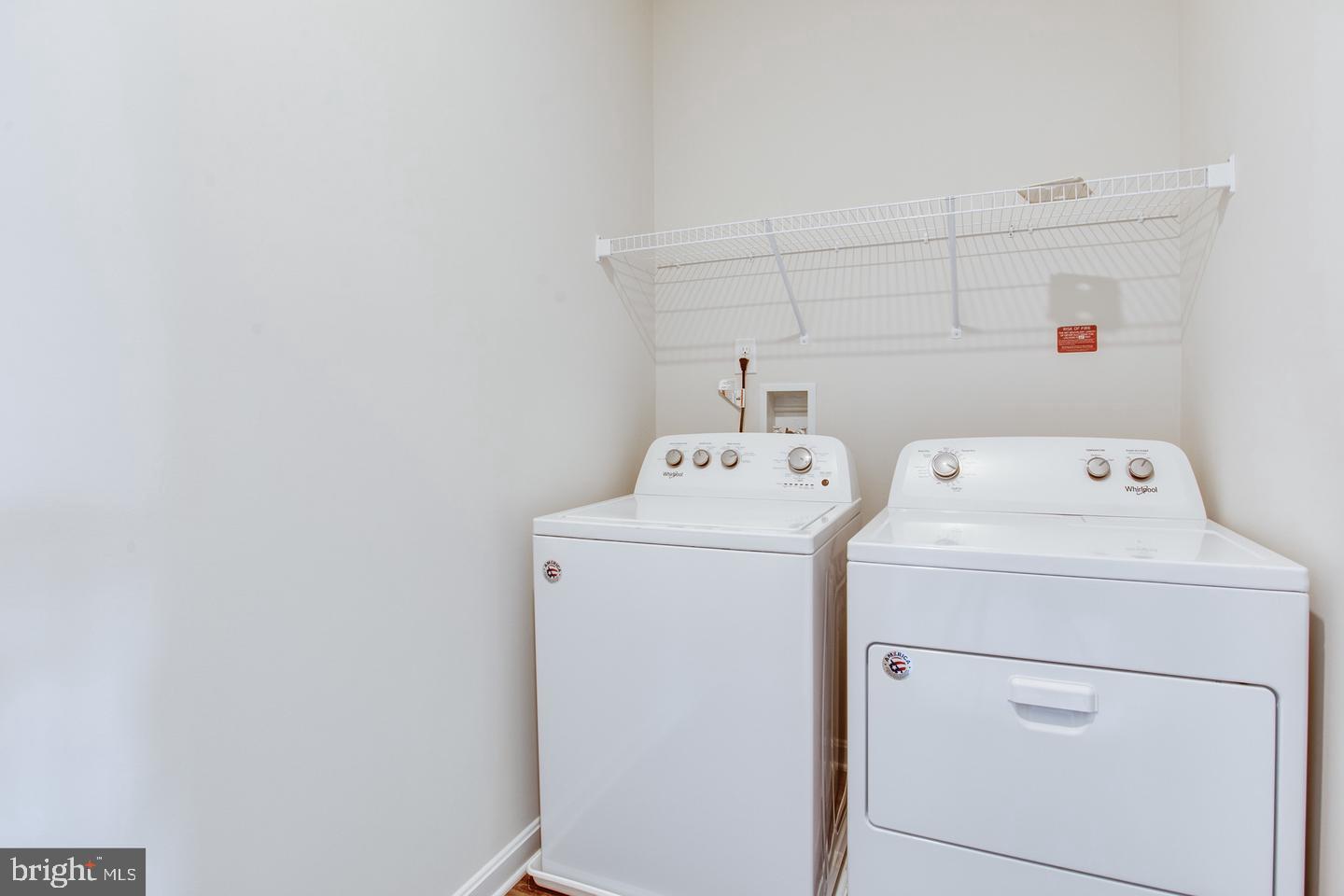 7068 Delegate Place Frederick, MD 21703 - Photo 44 of 76 a utility room with dryer and washer