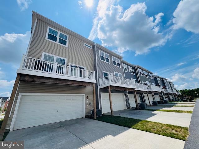 7068 Delegate Place Frederick, MD 21703 - Photo 5 of 76 a front view of a house with balcony