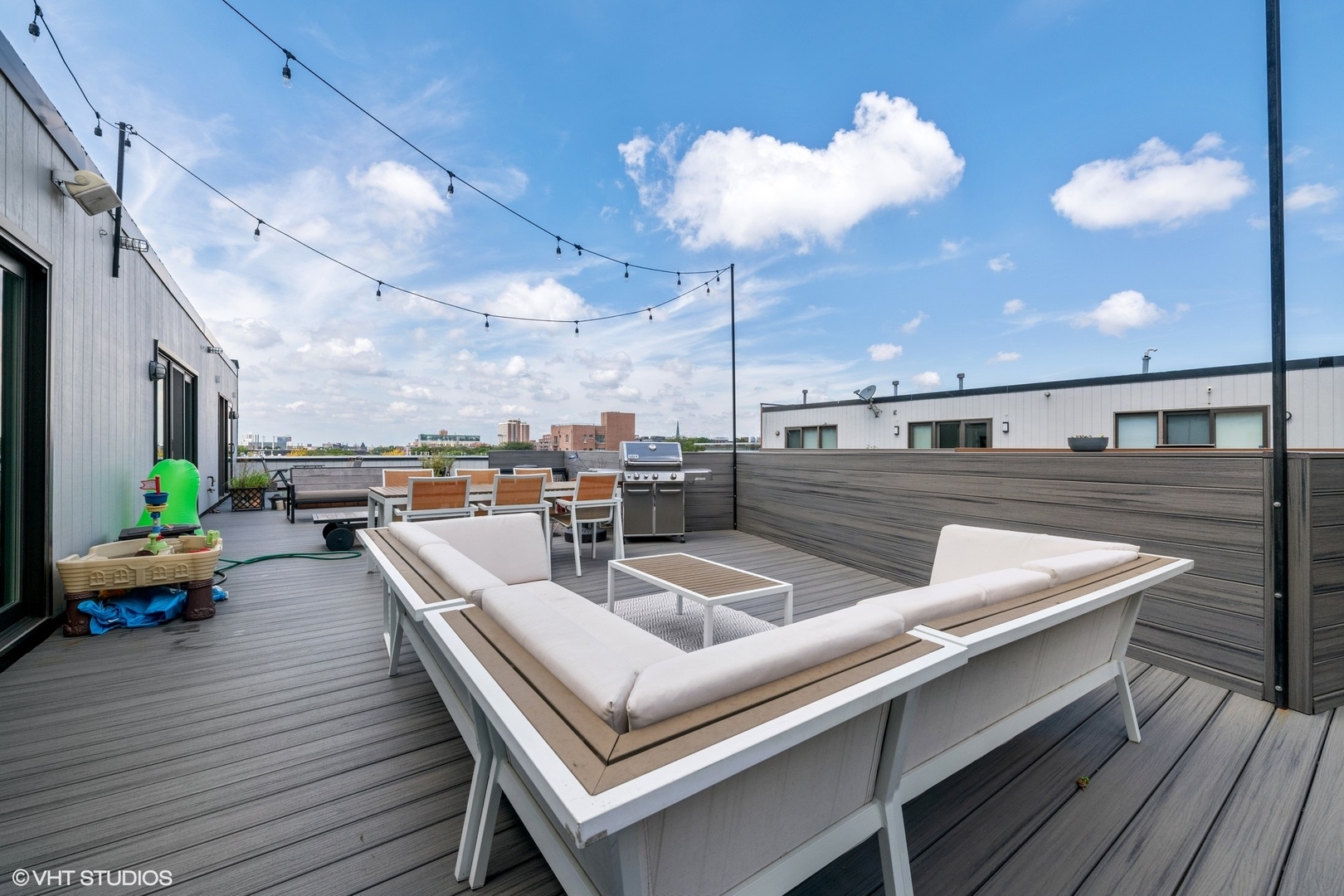 222 South Racine Avenue, Unit 48 Chicago, IL 60607 - Photo 14 of 21 a kitchen with counter space a sink appliances and living room view