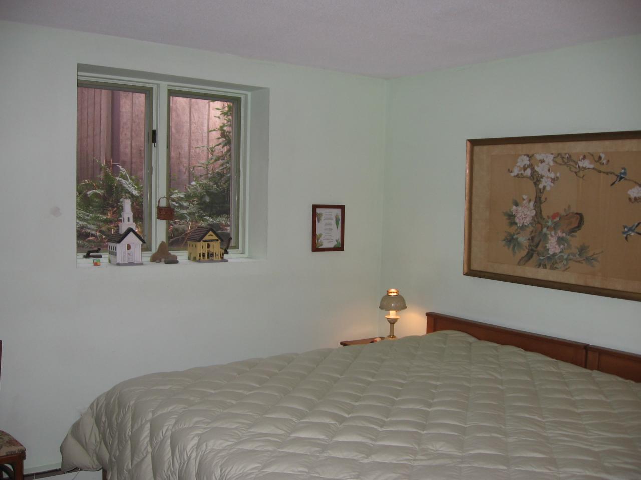 38 Rood Hill Road Sandisfield, MA 01255 - Photo 13 of 25 a bedroom with a bed and window