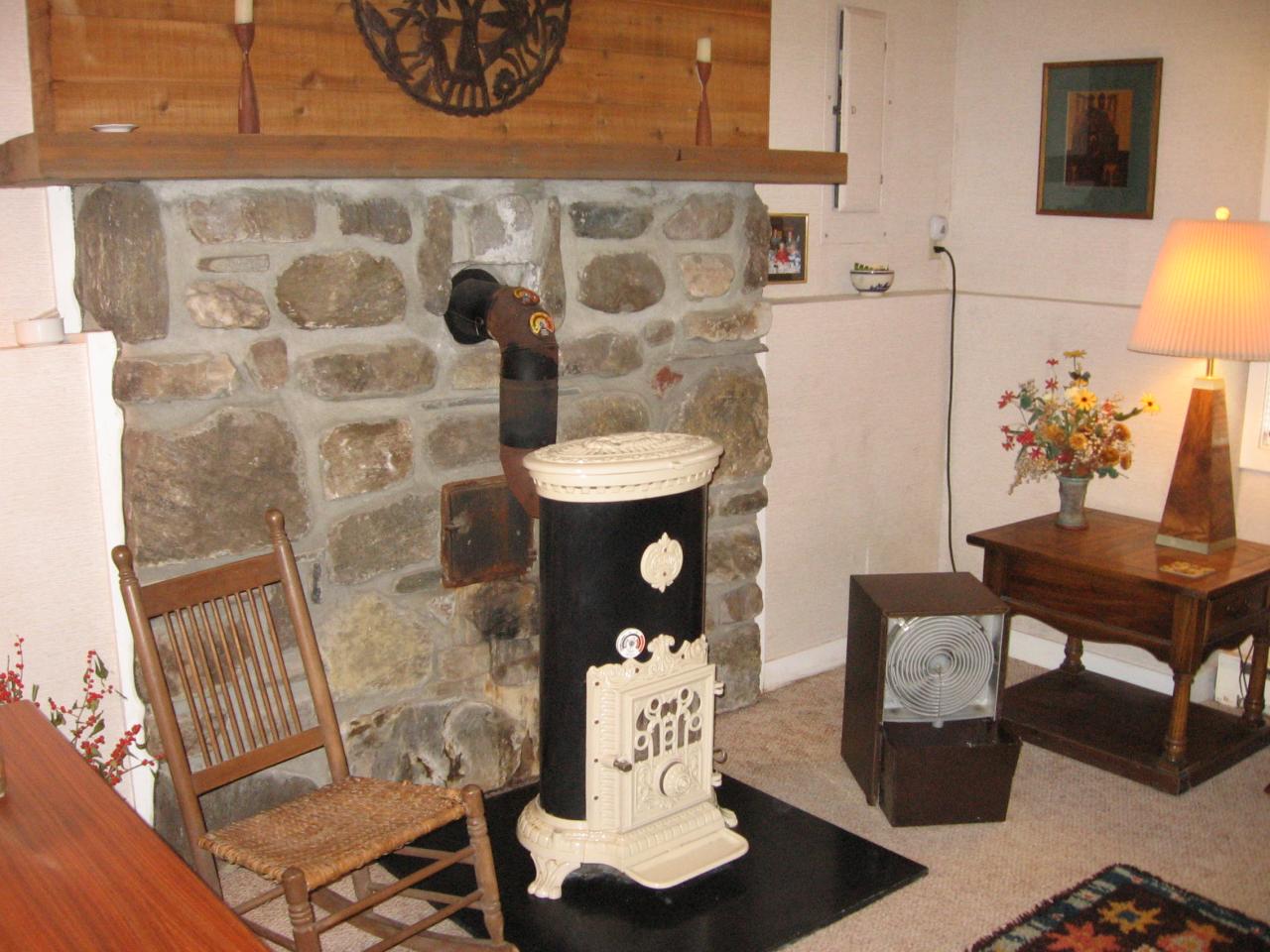 38 Rood Hill Road Sandisfield, MA 01255 - Photo 15 of 25 a living room with furniture and a fireplace