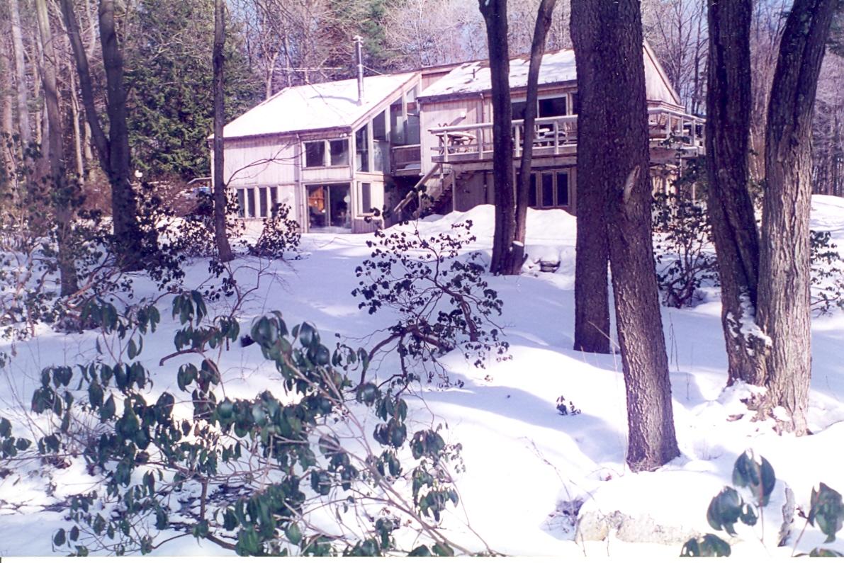 38 Rood Hill Road Sandisfield, MA 01255 - Photo 23 of 25 a view of a house with a yard covered with snow