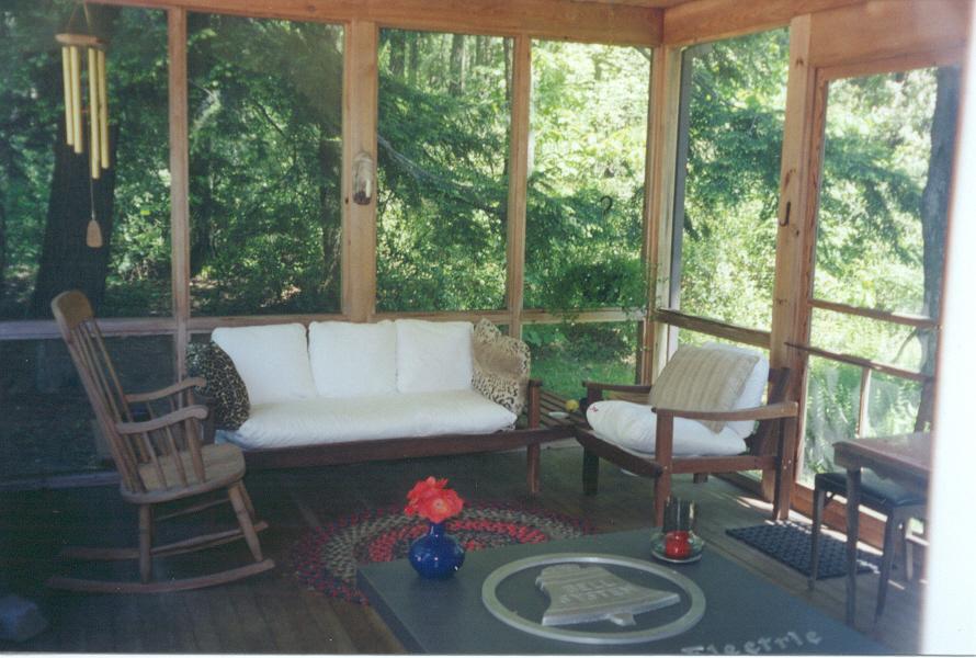 38 Rood Hill Road Sandisfield, MA 01255 - Photo 24 of 25 a living room with a table and chairs