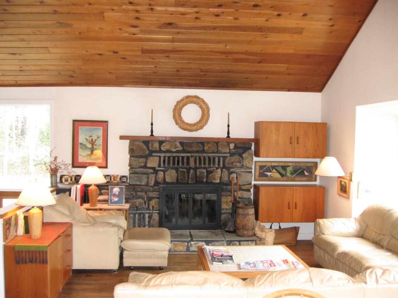 38 Rood Hill Road Sandisfield, MA 01255 - Photo 4 of 25 a living room with furniture and a fireplace