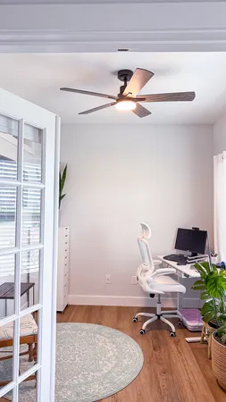 a workspace with furniture and window