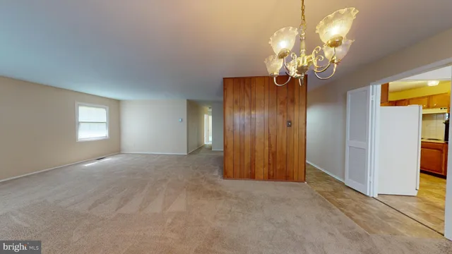 a view of a chandelier in a livingroom