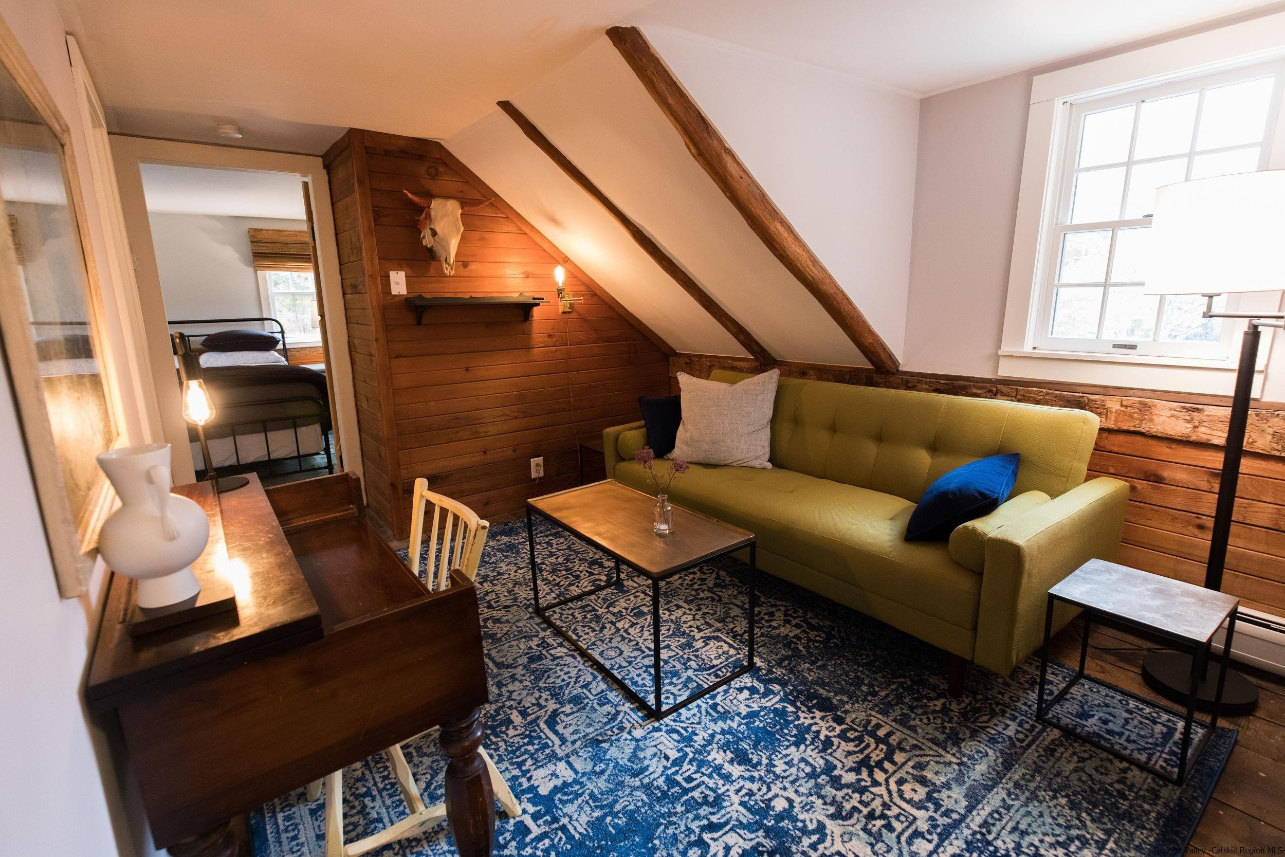 30 Old Farm Road Stone Ridge, NY 12484 - Photo 12 of 30 a living room with furniture a rug and a window