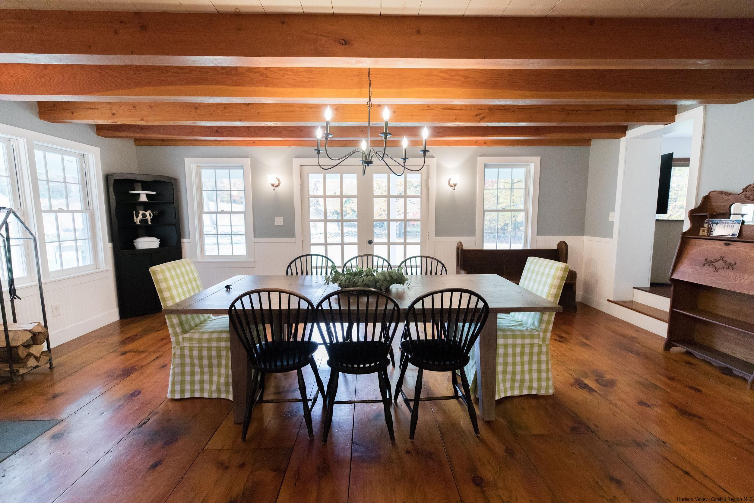 30 Old Farm Road Stone Ridge, NY 12484 - Photo 9 of 30 a view of a dining room with furniture window and wooden floor