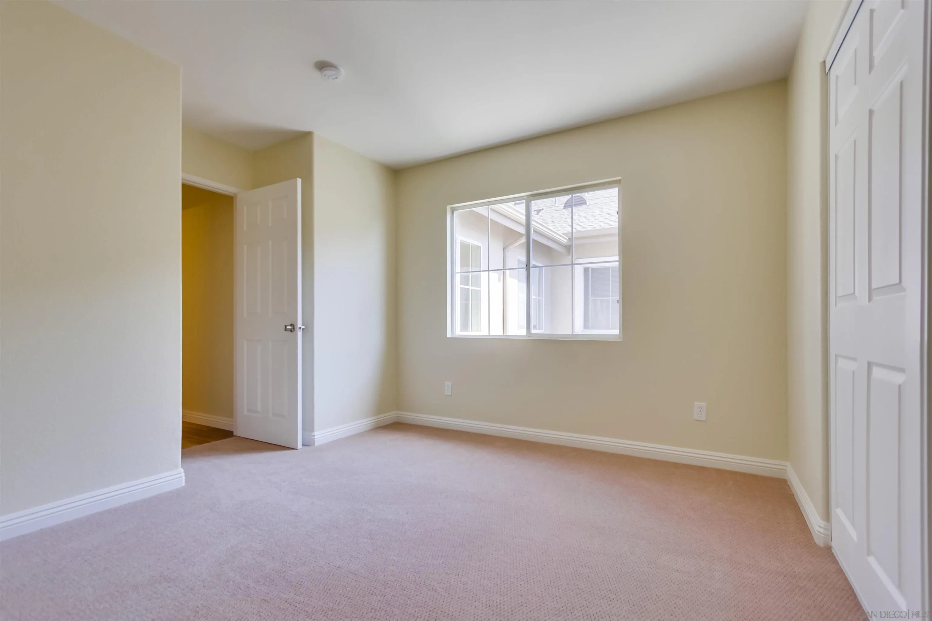 1201 Trapani Cove, Unit 4 Chula Vista, CA 91915 - Photo 22 of 37 a view of an empty room with a window