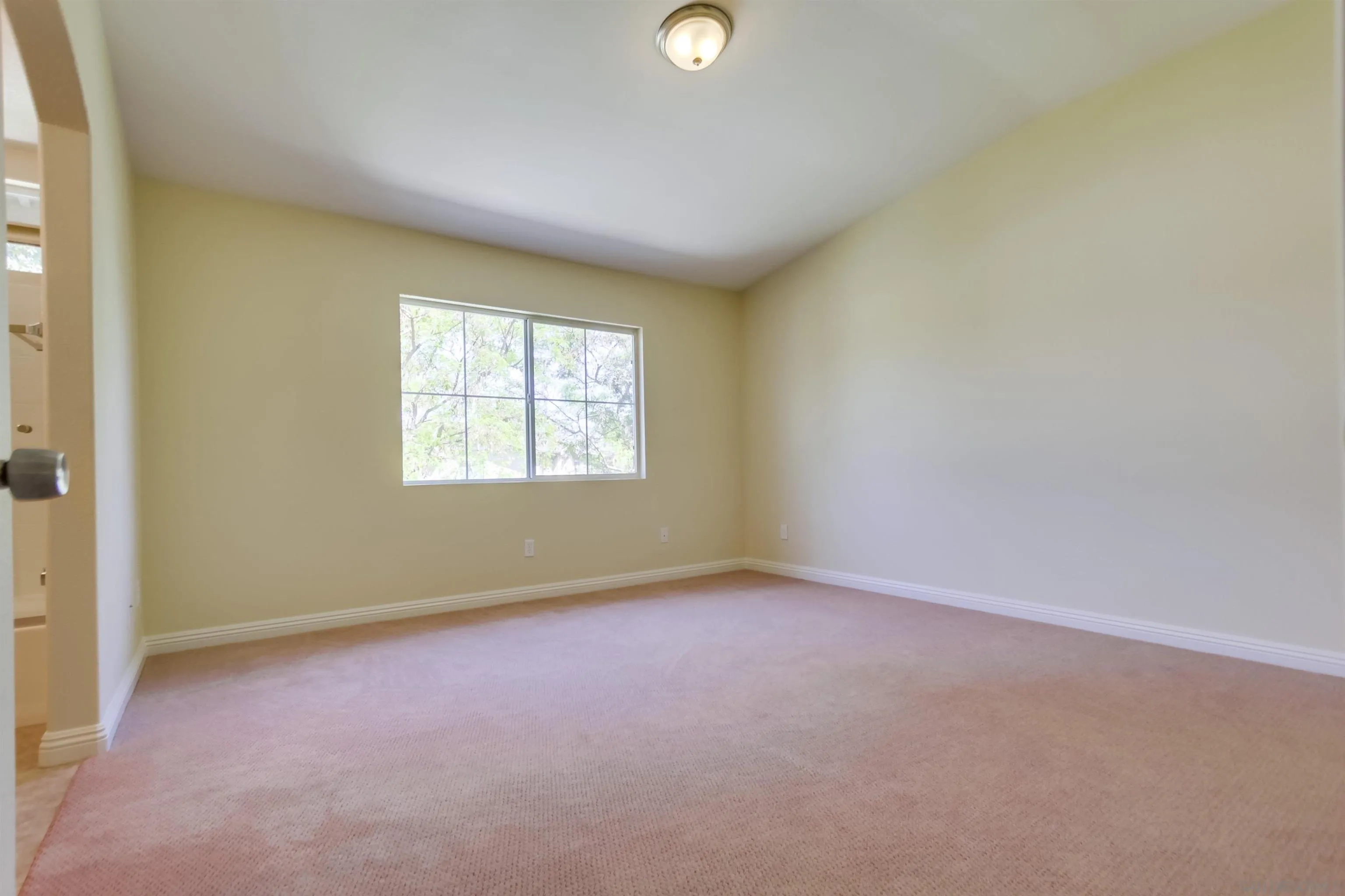 1201 Trapani Cove, Unit 4 Chula Vista, CA 91915 - Photo 24 of 37 an empty room with windows