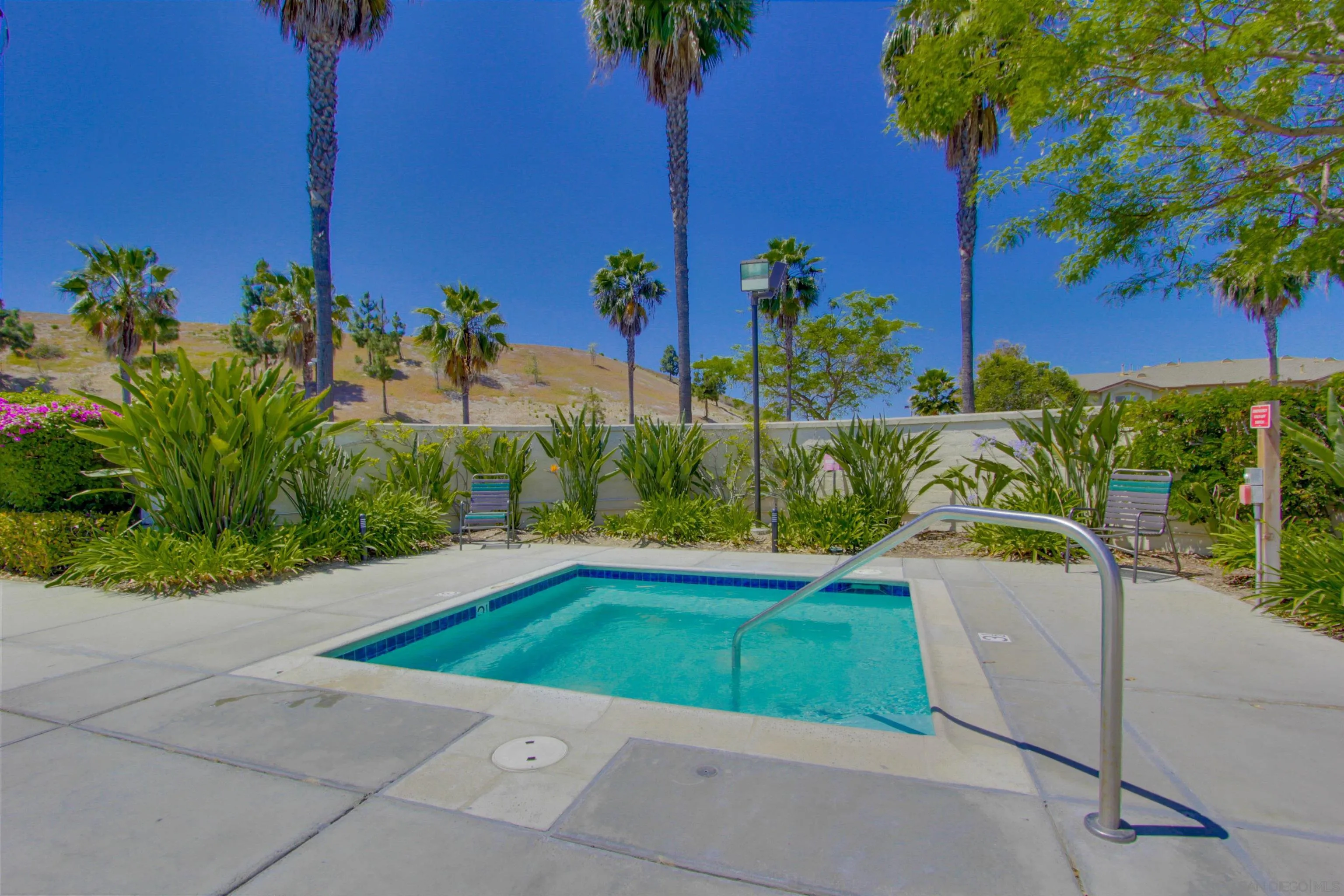 1201 Trapani Cove, Unit 4 Chula Vista, CA 91915 - Photo 32 of 37 a view of a backyard
