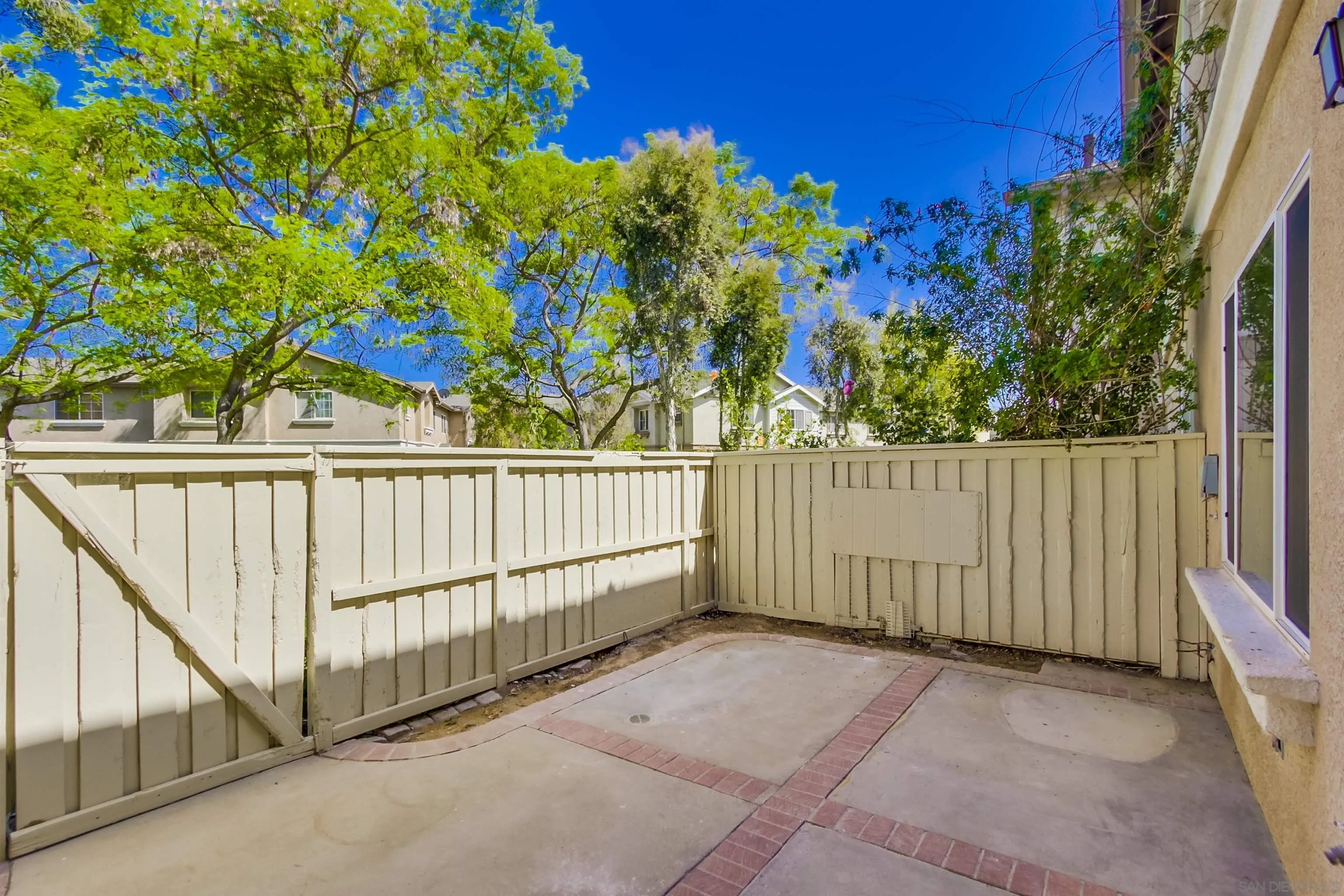 1201 Trapani Cove, Unit 4 Chula Vista, CA 91915 - Photo 4 of 37 a view of a fence