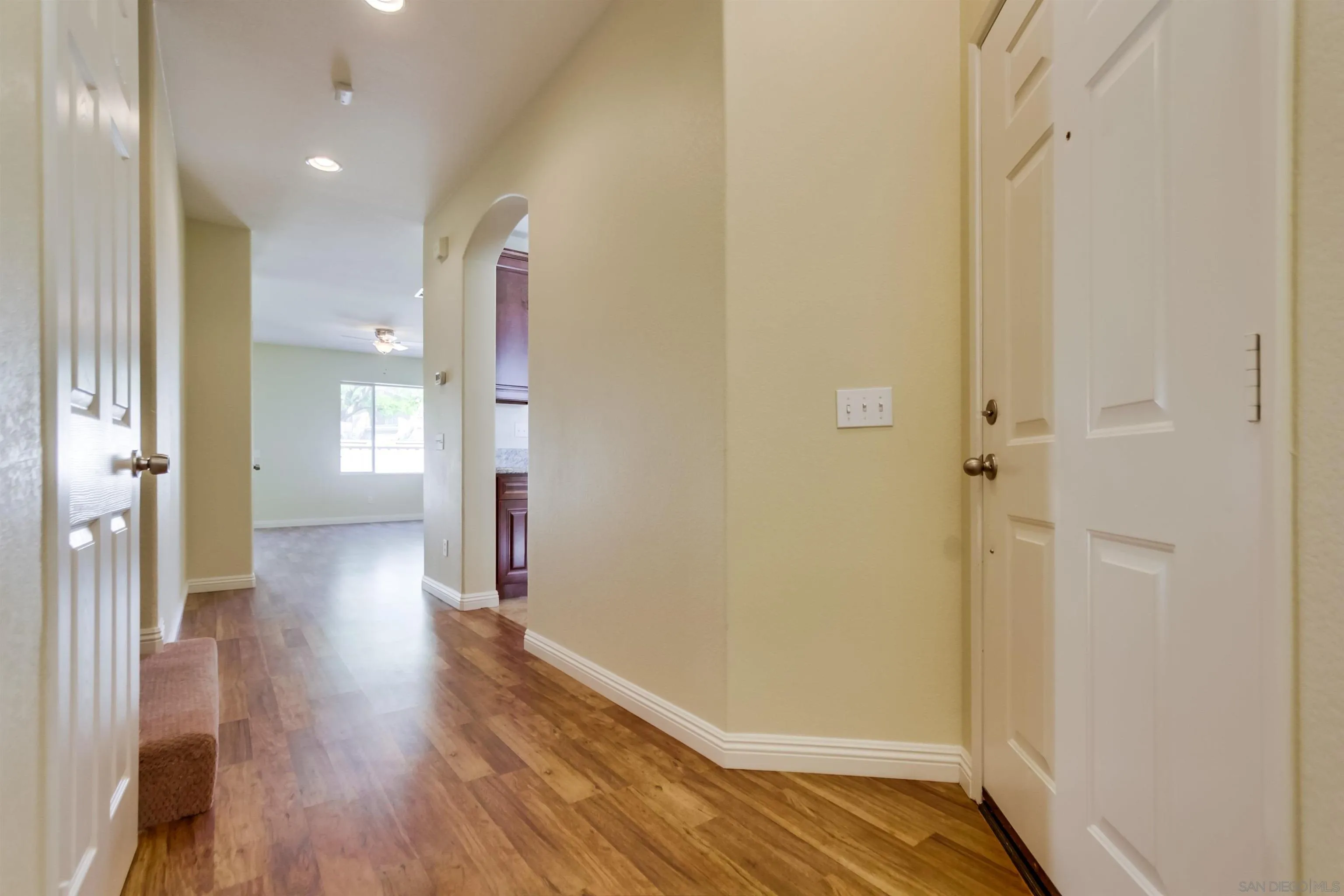 1201 Trapani Cove, Unit 4 Chula Vista, CA 91915 - Photo 10 of 37 a view of a hallway with wooden floor