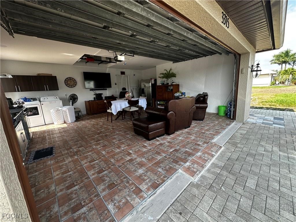 3315 37th Street Southwest Lehigh Acres, FL 33976 - Photo 12 of 34 a living room with furniture