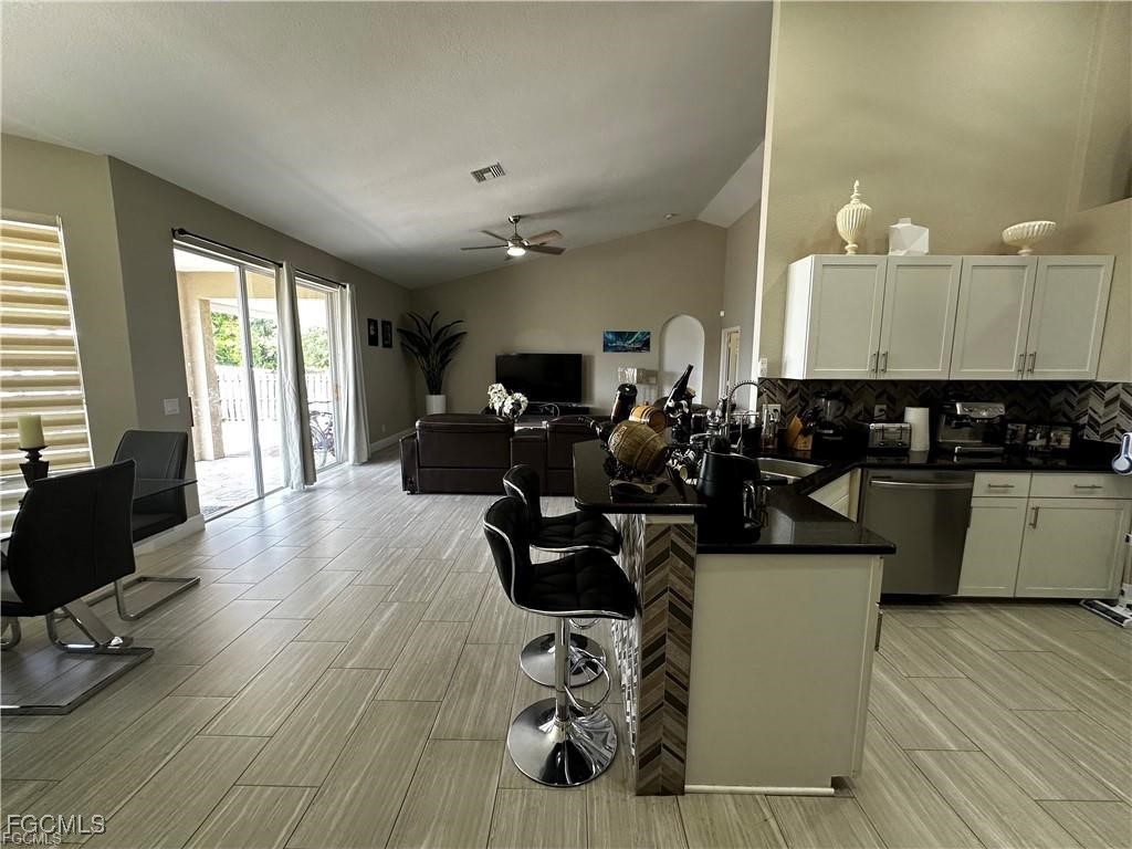 3315 37th Street Southwest Lehigh Acres, FL 33976 - Photo 18 of 34 a view of a room with gym equipment