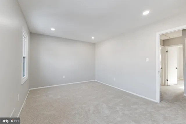 an empty room with a natural light