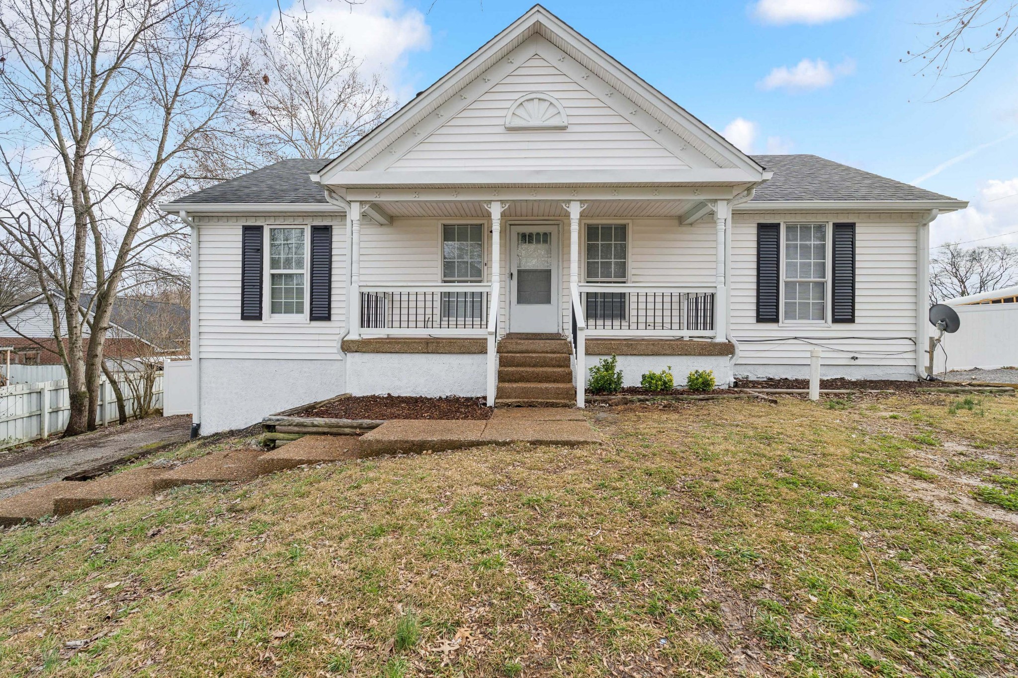 1205 Jacksons Hill Road Hermitage, TN 37076 - Photo 1 of 28 a front view of a house with a yard