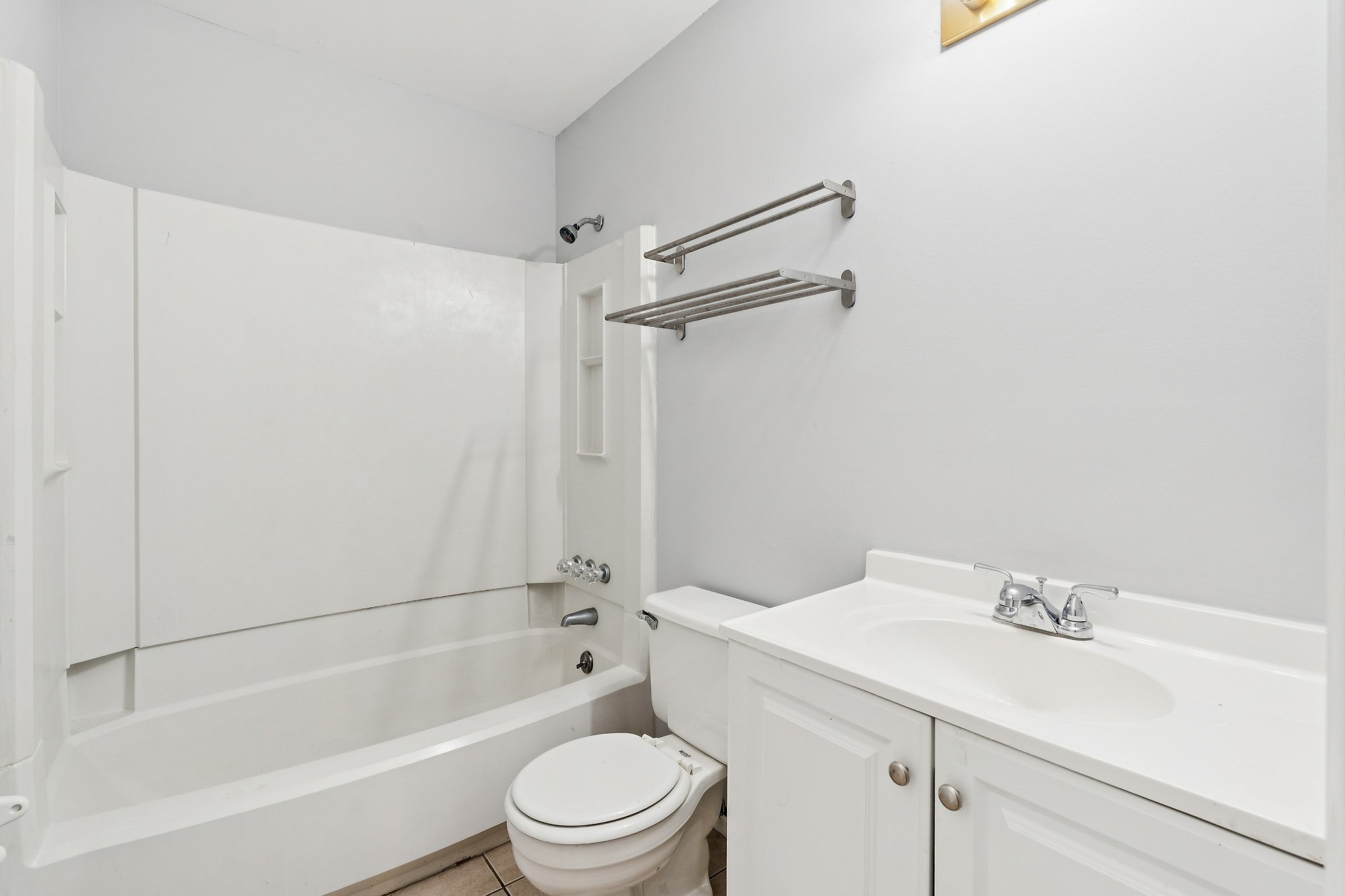 1205 Jacksons Hill Road Hermitage, TN 37076 - Photo 11 of 28 a bathroom with a sink toilet and shower