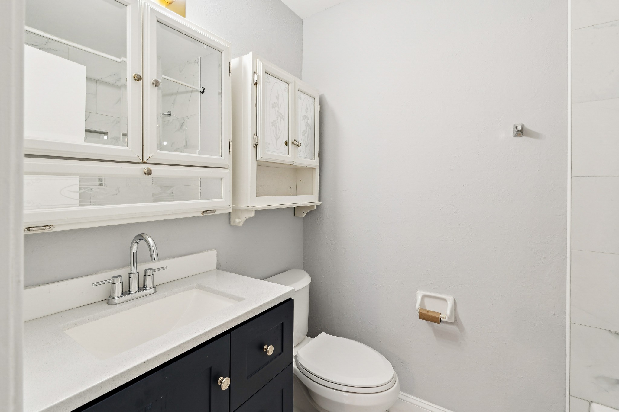 1205 Jacksons Hill Road Hermitage, TN 37076 - Photo 5 of 28 a bathroom with a sink a toilet and vanity