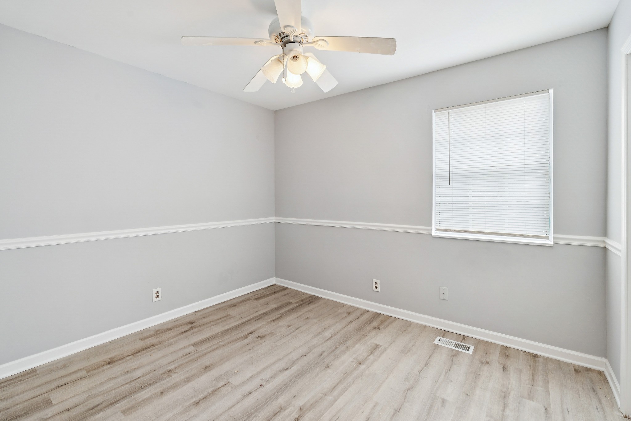 1205 Jacksons Hill Road Hermitage, TN 37076 - Photo 8 of 28 wooden floor in an empty room with a window