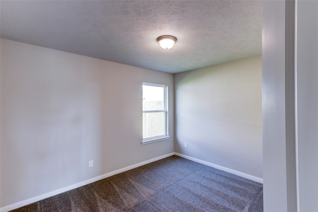 1937 Viva Road Bryan, TX 77807 - Photo 14 of 25 a view of empty room with window