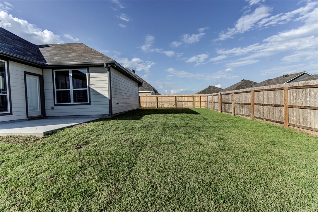 1937 Viva Road Bryan, TX 77807 - Photo 23 of 25 a view of a house with a backyard