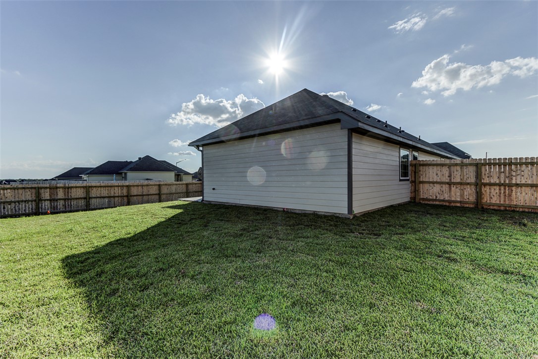 1937 Viva Road Bryan, TX 77807 - Photo 25 of 25 a view of a backyard with a garden