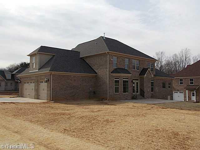 7757 Sutter Road Greensboro, NC 27455 - Photo 2 of 16 Exterior Back.