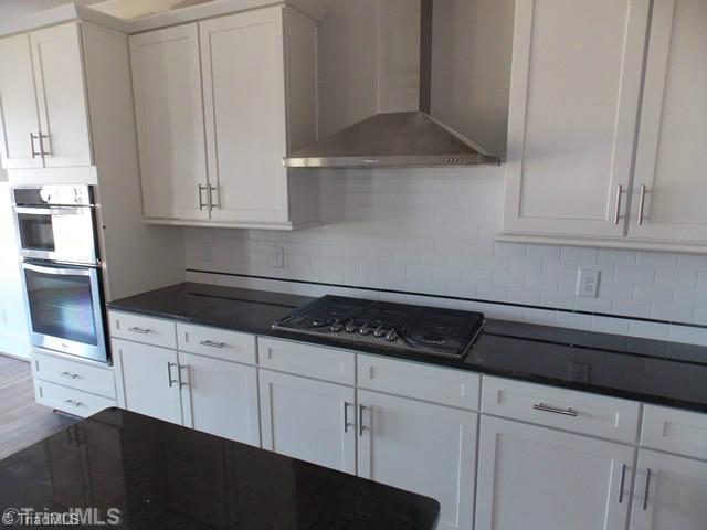 7757 Sutter Road Greensboro, NC 27455 - Photo 5 of 16 Kitchen.