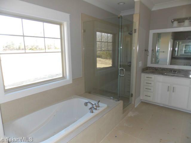 7757 Sutter Road Greensboro, NC 27455 - Photo 10 of 16 Master Bath/Spa.