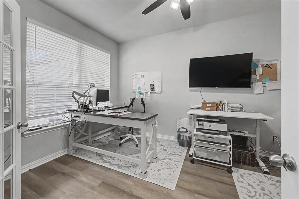 150 Oak Grove Drive Rhome, TX 76078 - Photo 17 of 40 a view of a workspace with furniture
