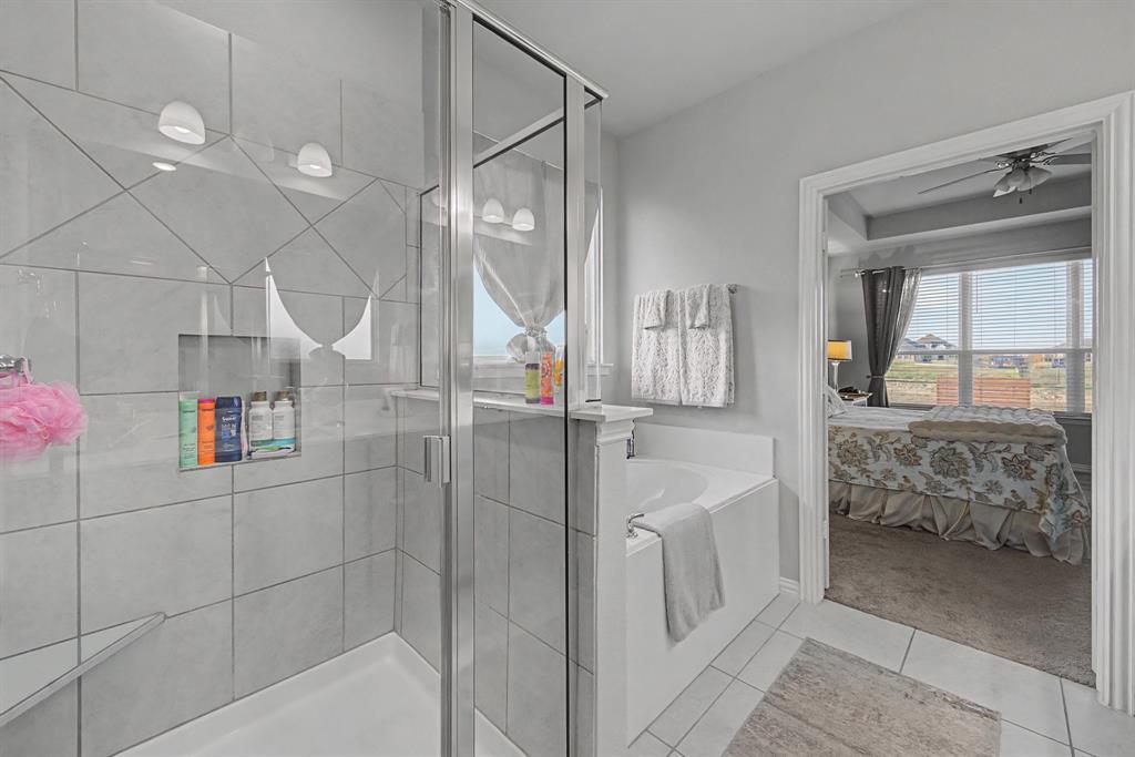 150 Oak Grove Drive Rhome, TX 76078 - Photo 19 of 40 a bathroom with shower