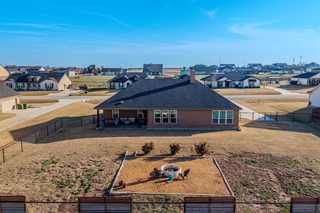 150 Oak Grove Drive Rhome, TX 76078 - Photo 36 of 40 a view of a terrace with wooden floor
